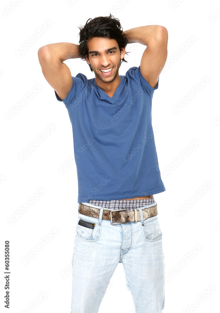 Portrait of a young man laughing with hand in hair Portrait of a young man laughing with hand in hair