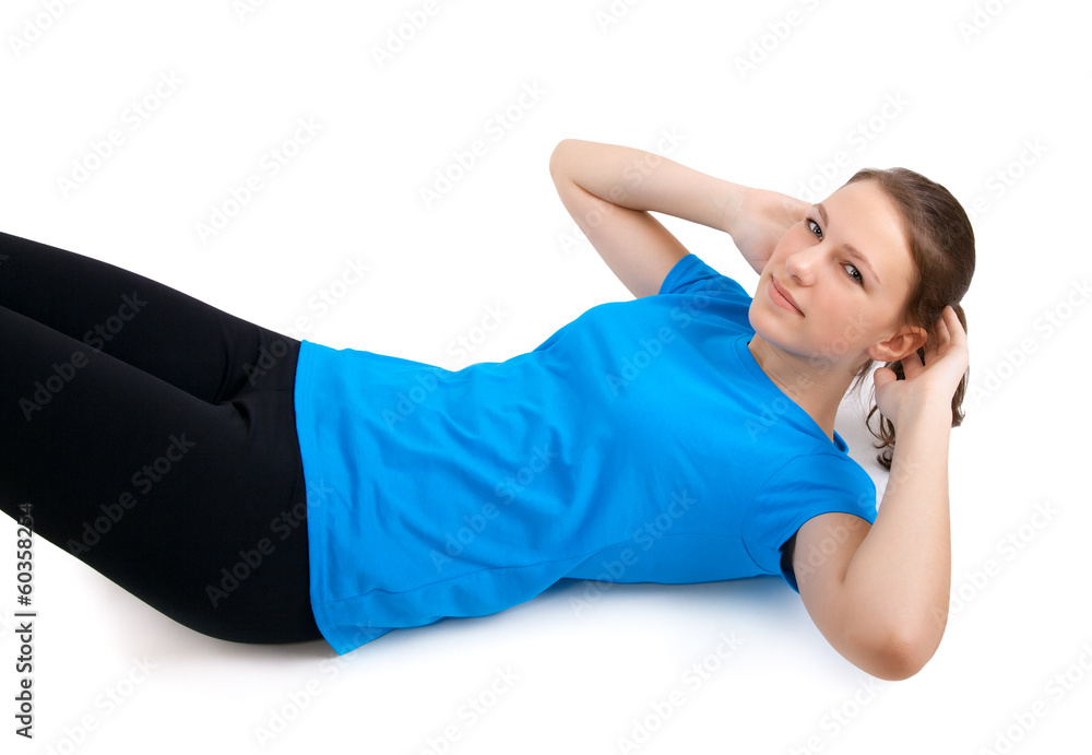 Fototapeta premium young woman doing sit ups