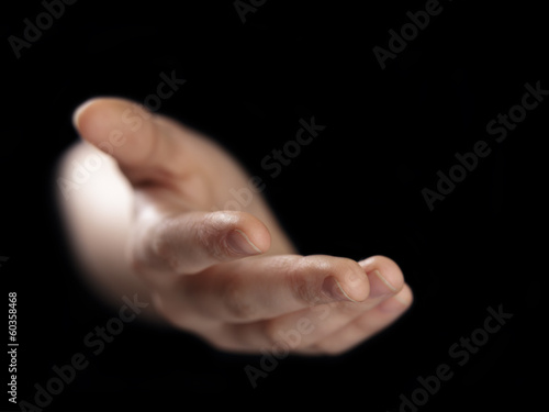 Fotografie female elping hand from darkness