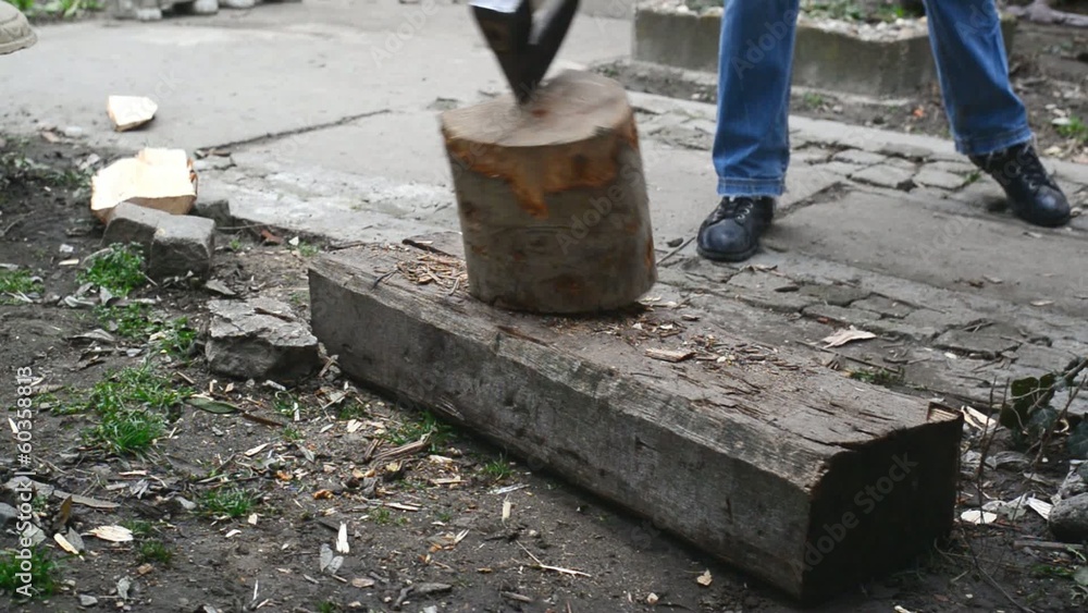 Lumber jack man chopping wood logs with ax. Making firewood Stock Video