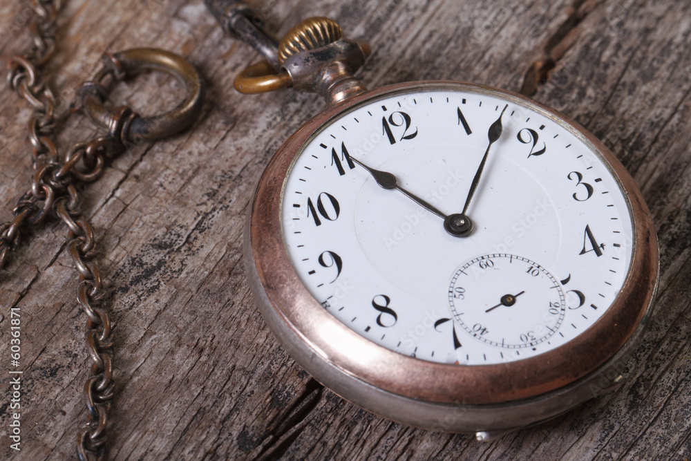 old pocket watch on a chain old pocket watch on a chain