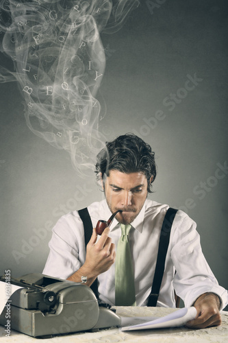 Portrait of an handsome journalist with smoking words
