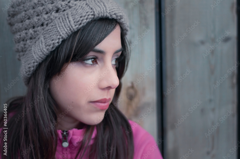 Fototapeta premium Portrait of a young woman's profile looking lonely