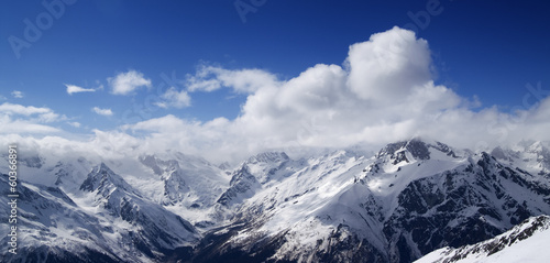 Panorama of Caucasus Mountains in sunny clouds © BSANI