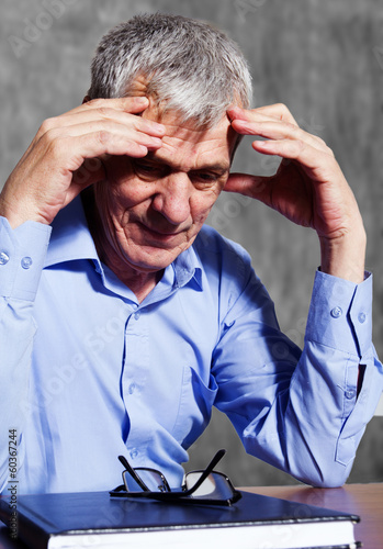 elderly stressed businessman