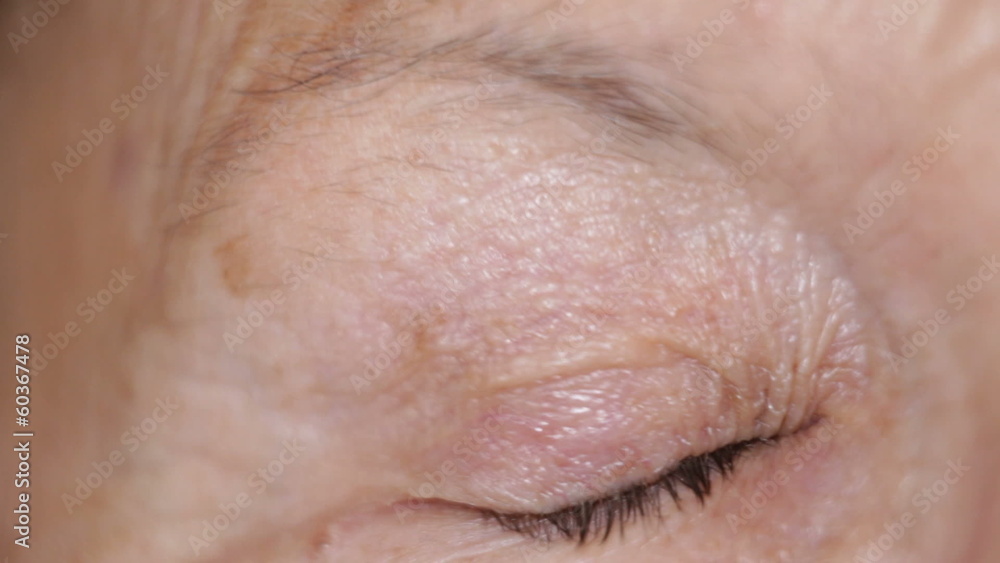 Macro of sleepy eye of senior female. Macro of sleepy eye of senior female.