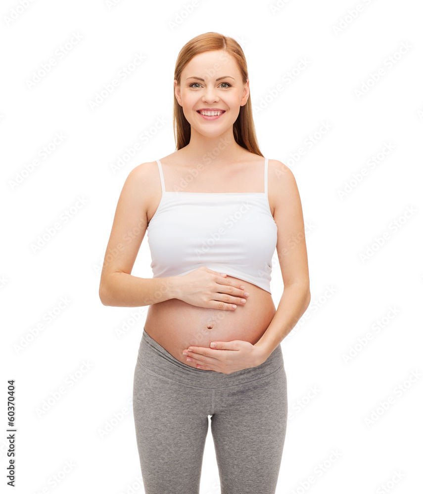 happy future mother touching her belly happy future mother touching her belly