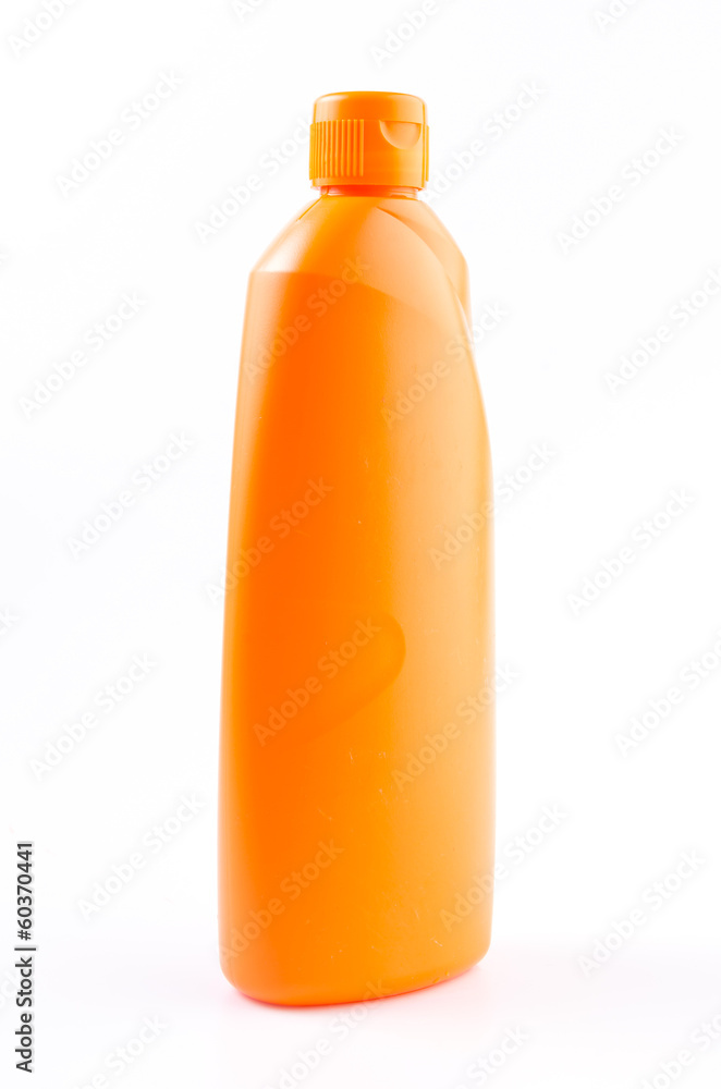 Orange cleaning bottle on isolated white background Orange cleaning bottle on isolated white background