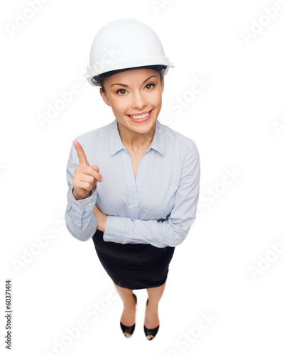 businesswoman in white helmet with finger up