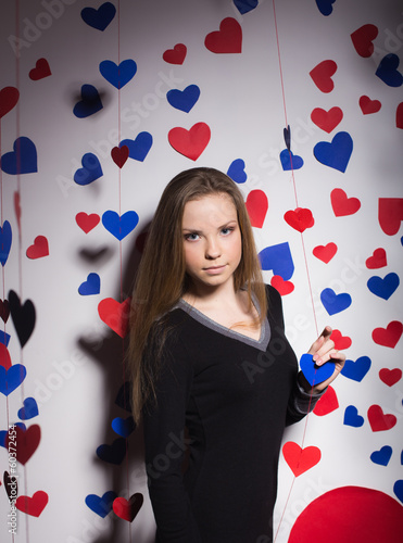 Valentine's Day. smiling woman with a gift in the form of heart