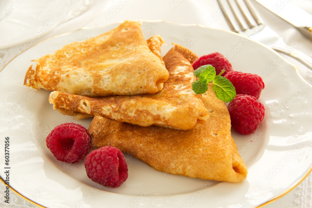 Delicious pancakes with berries and honey Delicious pancakes with berries and honey