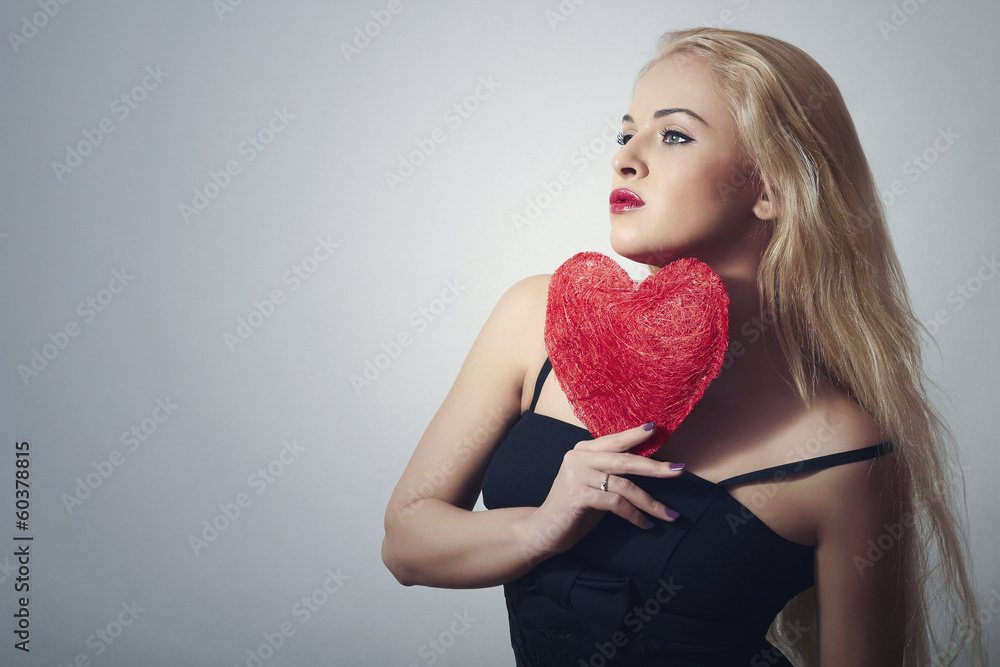 Beautiful Blond Woman with Red Heart.Love Symbol.Valentine's Beautiful Blond Woman with Red Heart.Love Symbol.Valentine's