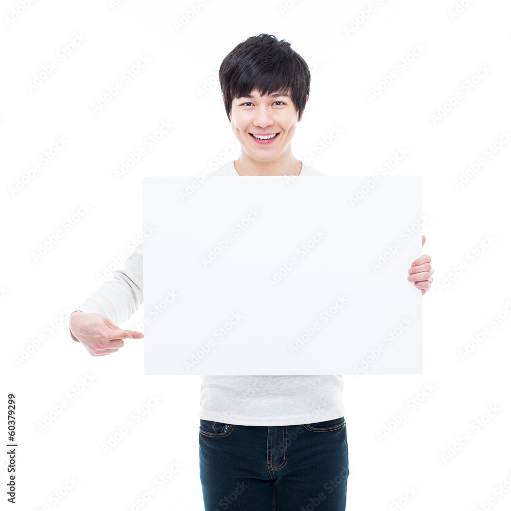 Young Asian man showing a pannel card Young Asian man showing a pannel card
