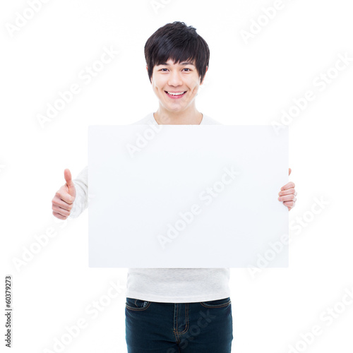 Young Asian man showing a pannel card