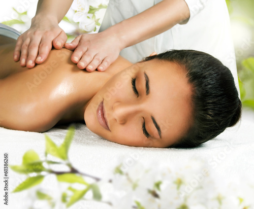 Beautiful girl getting a massage.