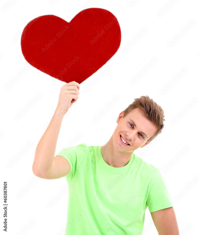 Handsome young man with big red heart, isolated on white Handsome young man with big red heart, isolated on white