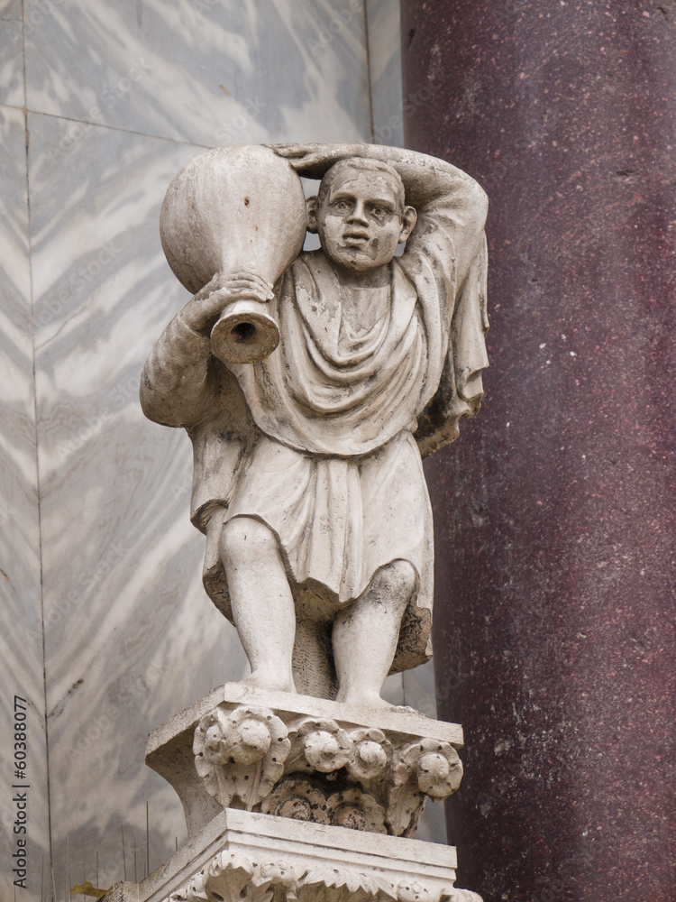 Fototapeta premium Man carrying a wine jug