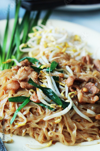Stir fried rice noodle on plate.