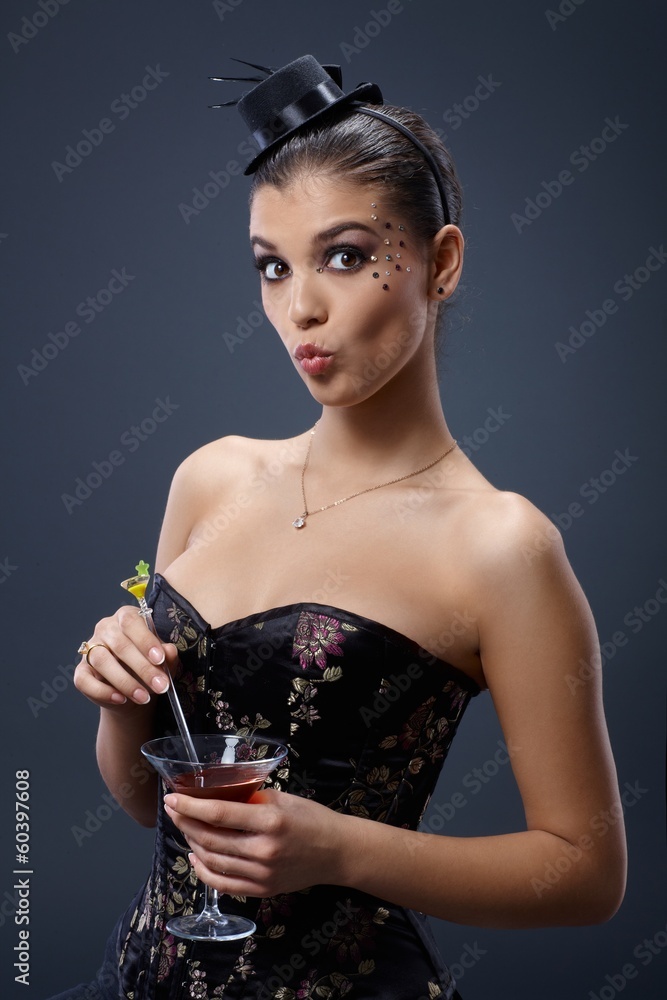 Surprised woman with cocktail glass Surprised woman with cocktail glass