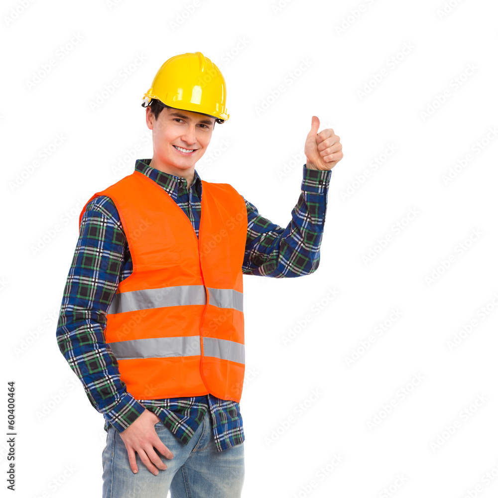 Construction worker in reflective clothing and showing thumb up. Construction worker in reflective clothing and showing thumb up.