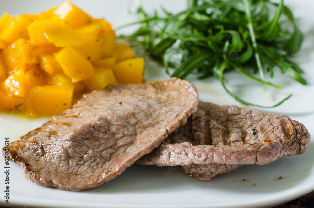 Grilled meat with pumpkin and ruccola Grilled meat with pumpkin and ruccola