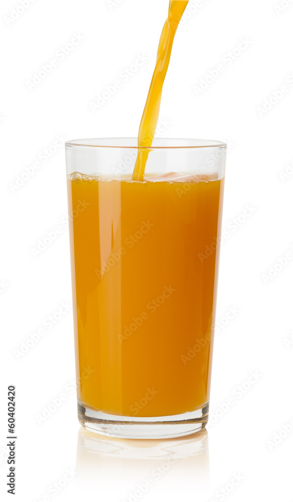 Pouring orange juice  into glass on white background