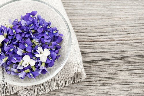 Edible violets in bowl