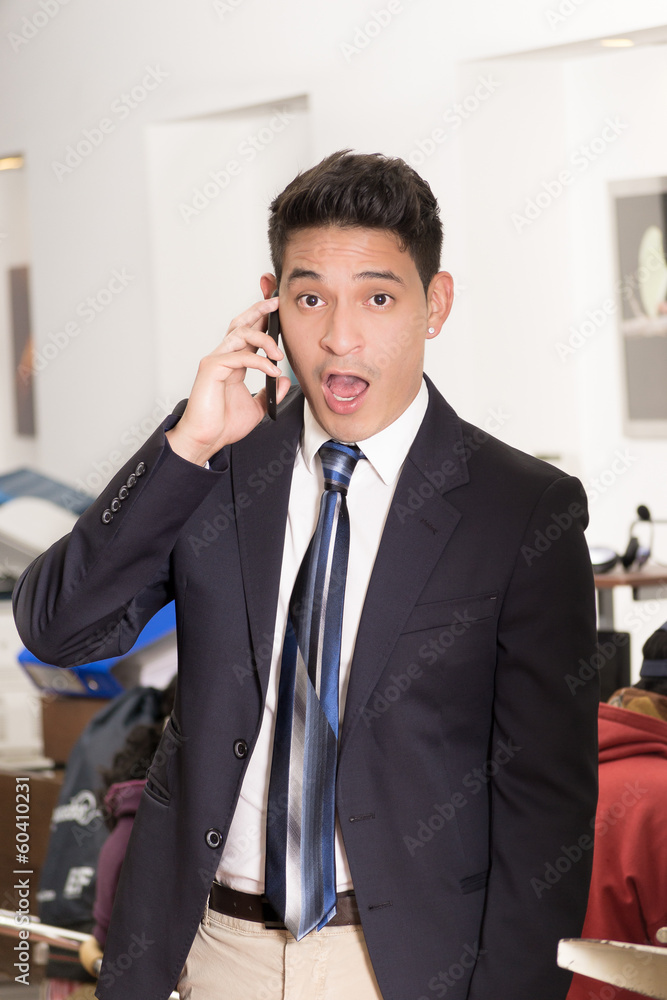 Portrait of hispanic man with shocked facial expression Portrait of hispanic man with shocked facial expression