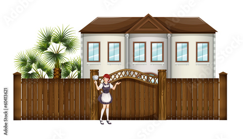 A housemaid in front of the big house