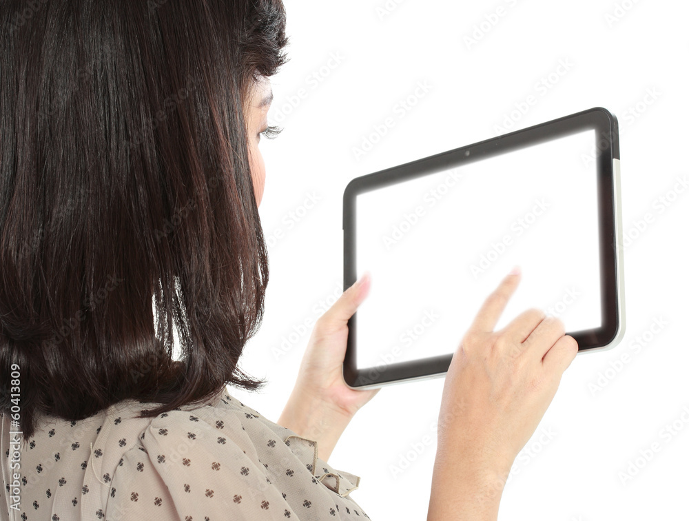 Businesswoman standing with touch pad
