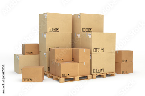 Cardboard boxes on a pallet. Isolated on white background. photo