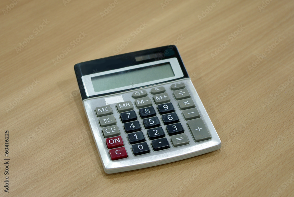 calculator on wood tablecalculator on wood table calculator on wood tablecalculator on wood table