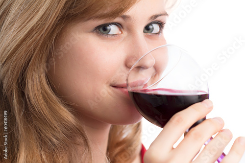 beautiful girl with a glass of red wine