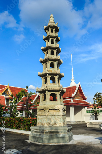 Chinese stone pagoda at Wat Nang Bangkok Thailand.