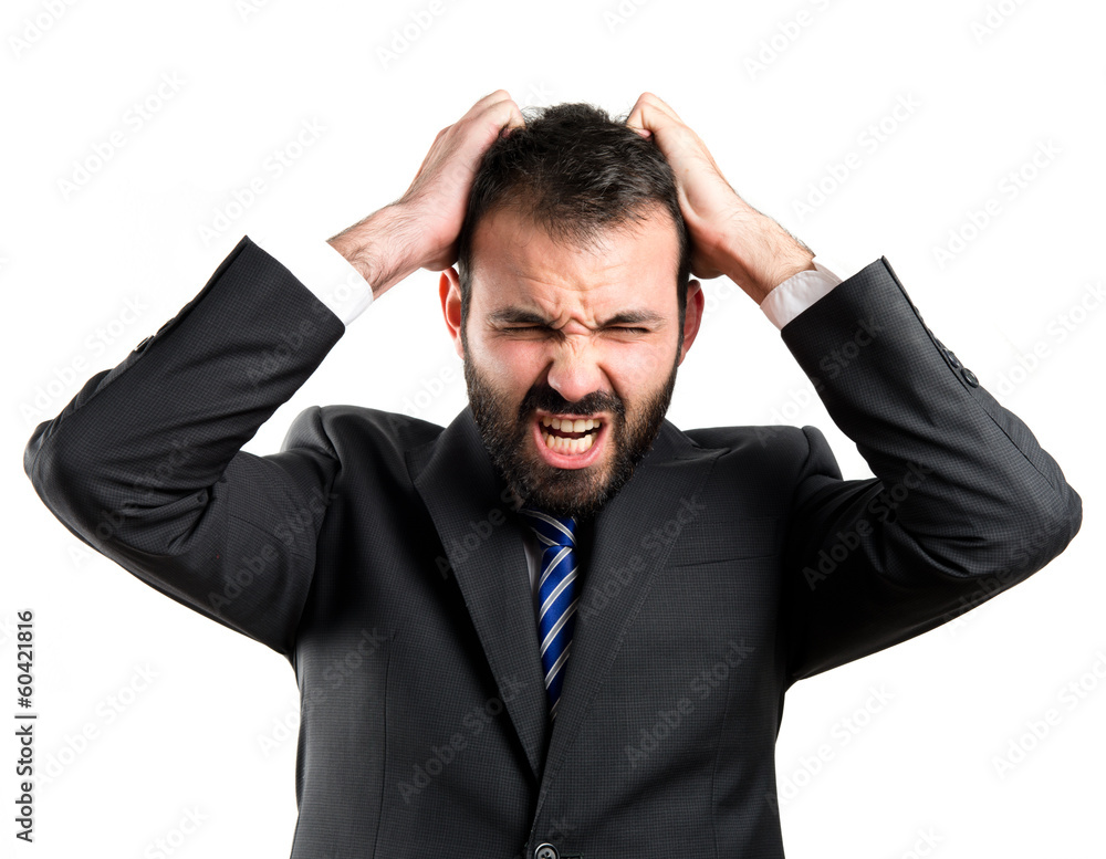 Young man furious over white background Young man furious over white background