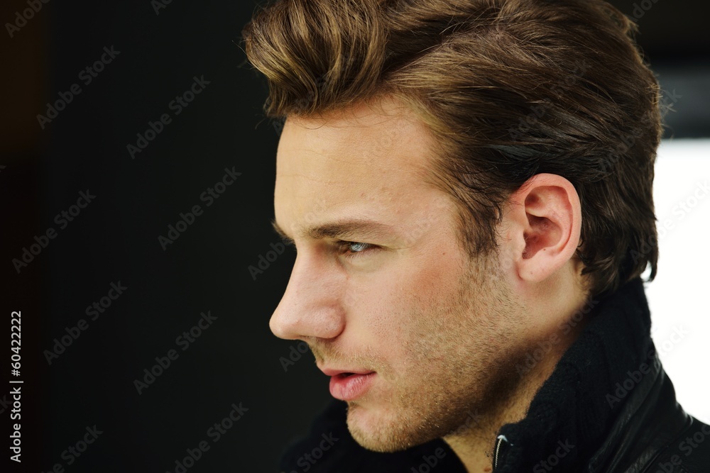 Fototapeta premium Young man studio shoot posing closeup