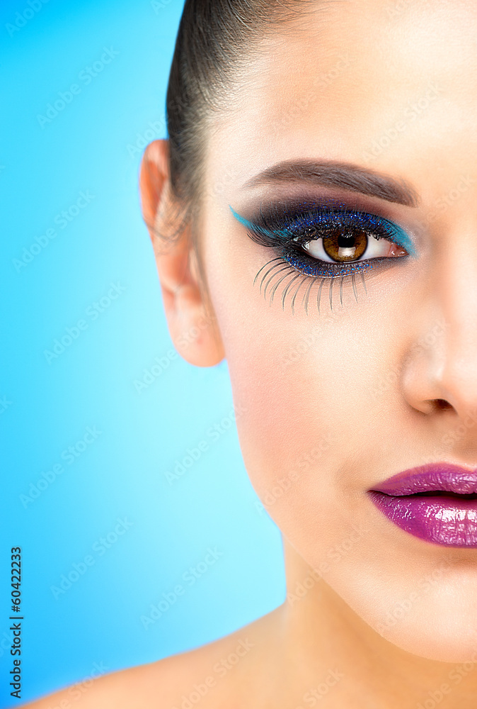 Fototapeta premium Extreme makeup. Beautiful half face
