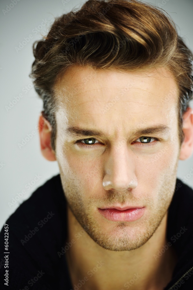 Young man studio shoot posing closeup