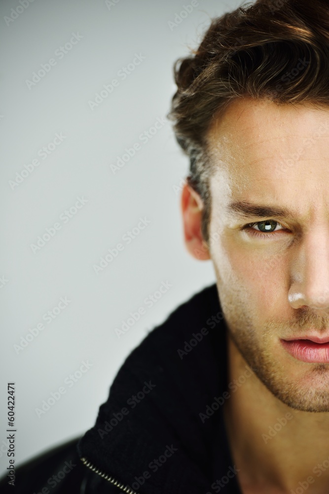 Young man studio shoot posing closeup Young man studio shoot posing closeup