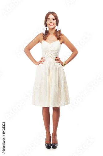 Lovely woman in sundress against white background