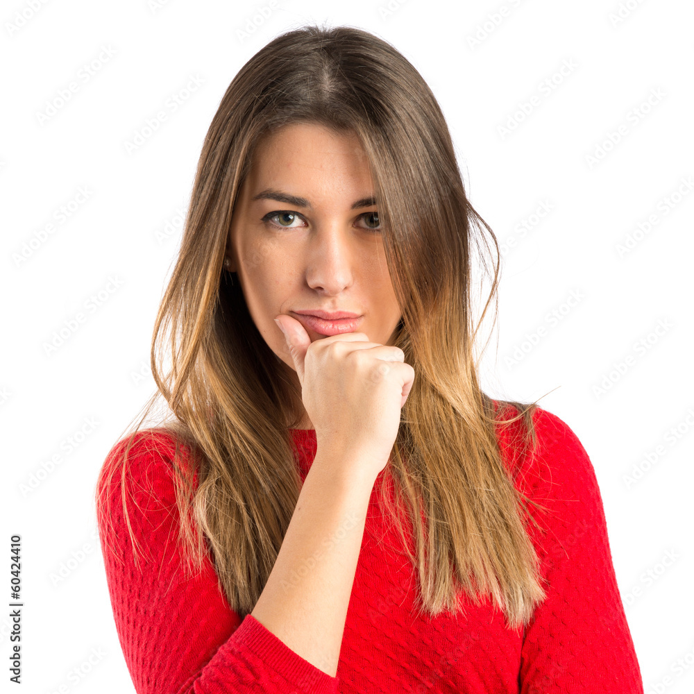 Cute young girl thinking an idea over isolated white background Cute young girl thinking an idea over isolated white background