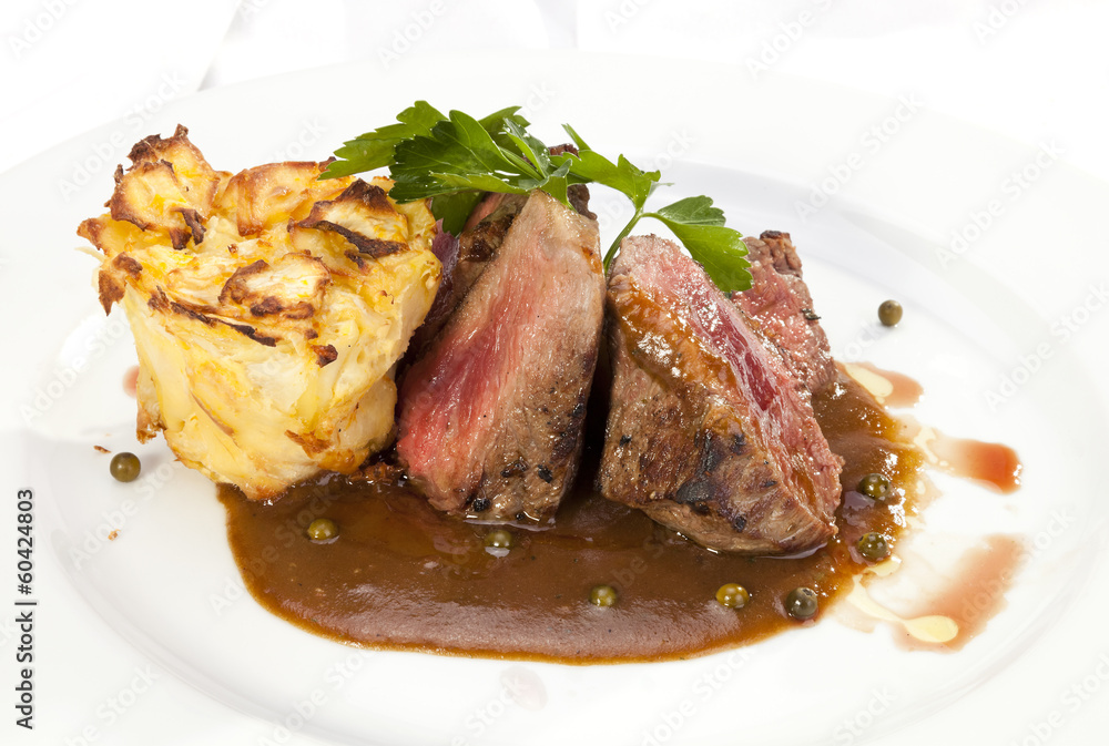 Grilled Sirloin with pepper sauce and potatoes Grilled Sirloin with pepper sauce and potatoes