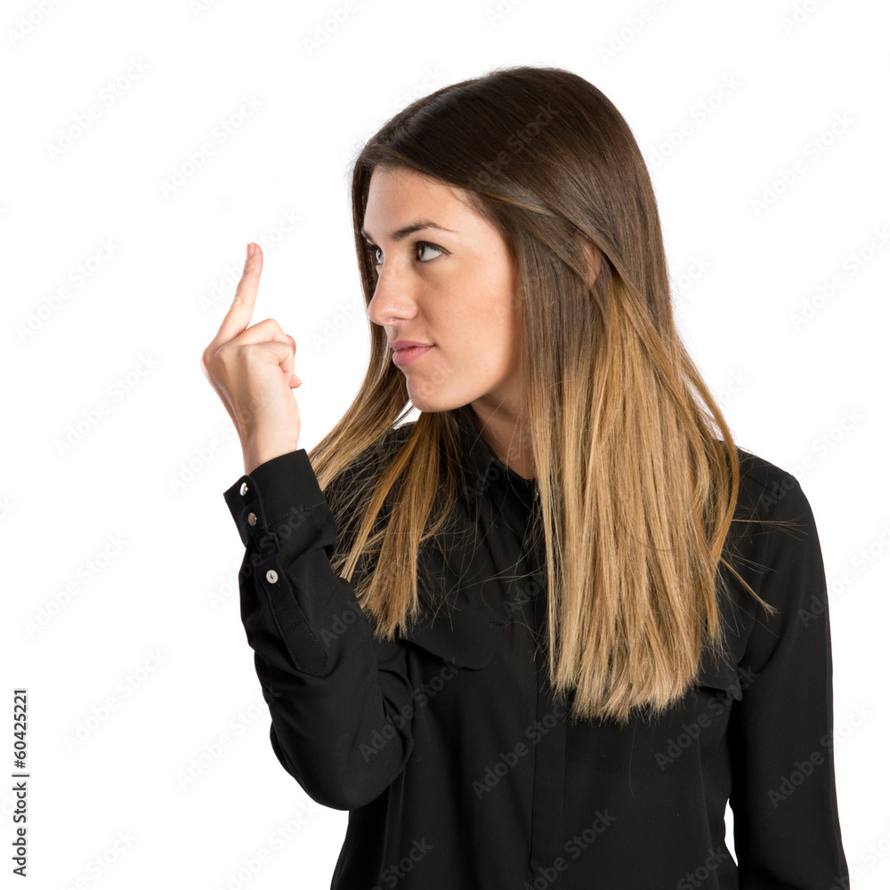 young girl making horn gesture over white background young girl making horn gesture over white background