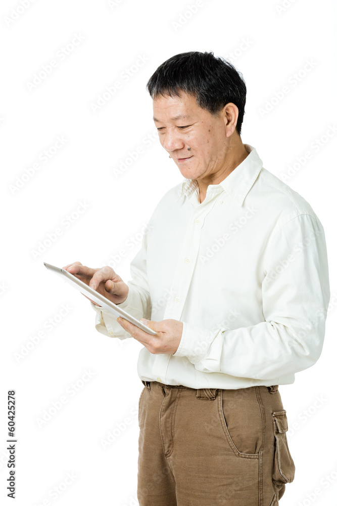 Asian senior man using tablet Asian senior man using tablet