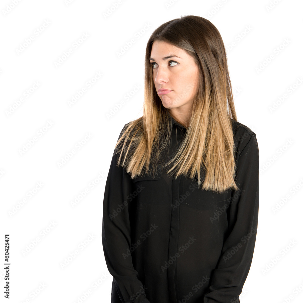 Sad young girl isolated over white background Sad young girl isolated over white background
