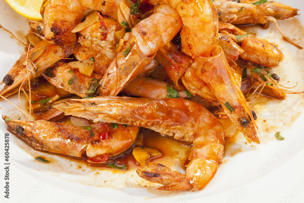 Shrimps prepared with garlic, chilli, white wine and balsamic vi Shrimps prepared with garlic, chilli, white wine and balsamic vi