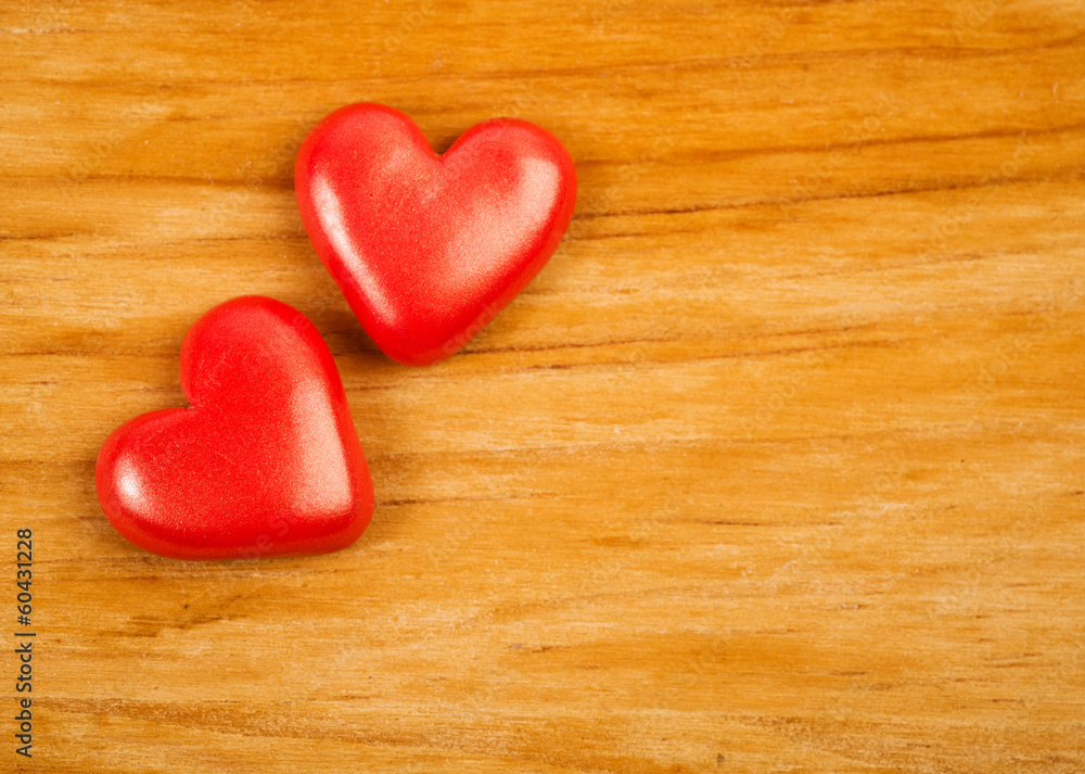 red hearts on wooden background red hearts on wooden background