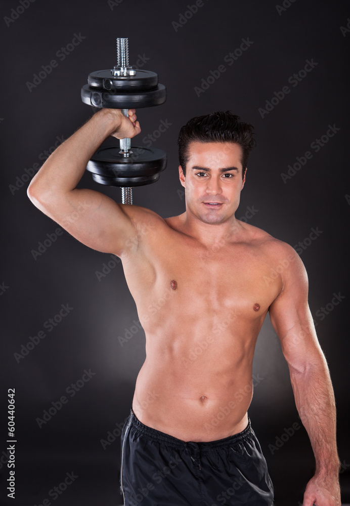 Man Exercising Dumbbells Man Exercising Dumbbells
