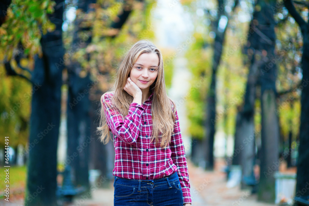 Pretty young girl in a fall or spring park Pretty young girl in a fall or spring park