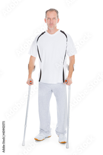 Mature Man With Crutches